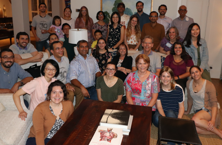 Another surprise! A party at the Cooperâs house after the reunion symposium.